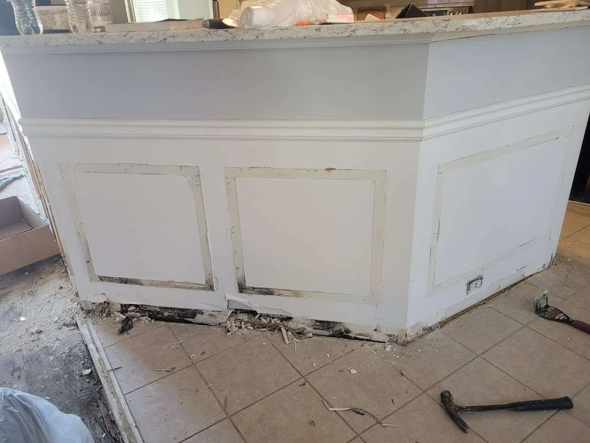 Water damage and mold on kitchen during Storm Damage Restoration in Freeport
